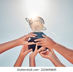 Teamwork, Sports And Hands Of People With Trophy For Winner, Achievement And Champion Success. Support, Community And Diversity With Women And Award For Training, Commitment And Collaboration