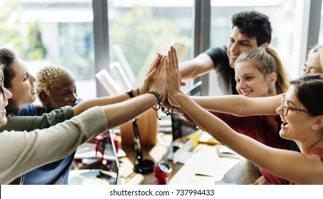Teamwork successful high five together - Shutterstock ID 737994433