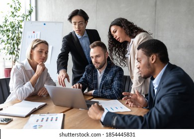 Teamwork. United Business Team Working Together At Laptop During Corporate Meeting In Modern Office. Coworkers Unity, Diverse Colleagues Work At Project, Staff Collaboration And Cooperation