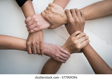 Teamwork, vision, young people United Hands together expressing positive, tag team, team, friendship, spirit, one heart,  mission, connection, partnership, deal, volunteer concepts. 