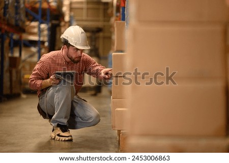 Teamwork of workers working in large warehouse retail store industry.Rack of stock storage. Interior of cargo in ecommerce and logistic concept. Depot. People lifestyle. Shipment service for container
