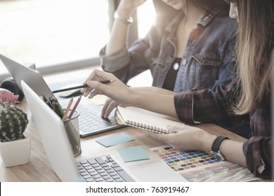 Teamwork,brainstorming concept. Creative designer at the workshop. Young creative design team working with new startup project in modern office. - Powered by Shutterstock