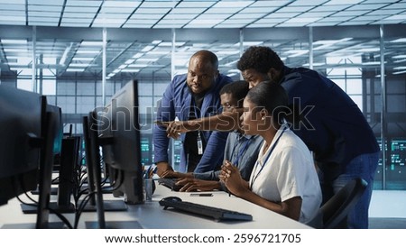 Teamworking engineers talking in server room, developing disaster recovery plans ensuring minimal downtime. Team of data center employees doing brainstorming, monitoring performance, camera A