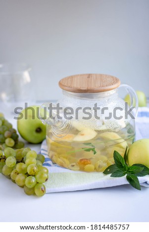TEAPOT WITH BERRY TEA.  chai with mint and apple. grape. modern glass teapot with double bottom cup