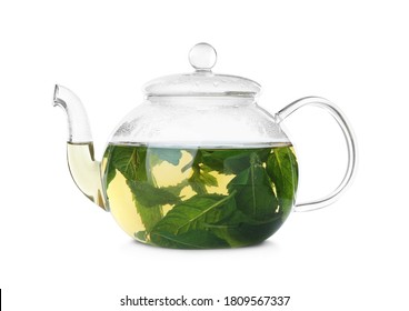 Teapot with hot aromatic mint tea isolated on white