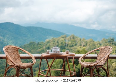 teapot set on table in the morning with mountain view at countryside home or homestay. Vacation, travel and trip concept - Shutterstock ID 2117169599