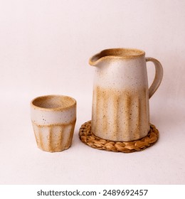 teapot set with two white cream begrone glasses made from ceramic - Powered by Shutterstock