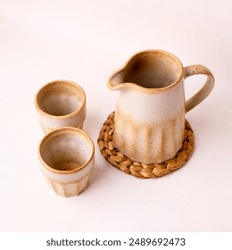 teapot set with two white cream begrone glasses made from ceramic - Powered by Shutterstock