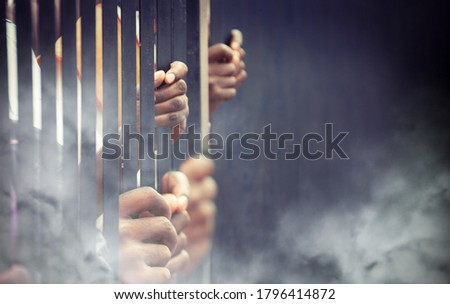 tear gas thrown to the protesters behind bars