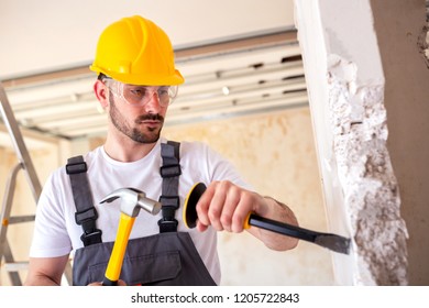 Tearing Down A Worn Out Wall With Manual Work Tolls