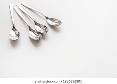 teaspoons on white background, set of teaspoons