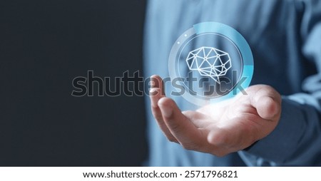 Tech ai analyzing data. Technology artificial intelligence analysis. A man is holding a brain in his hand. The brain is surrounded by a blue circle.