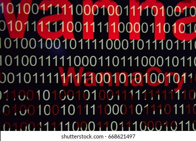 Tech Digital Data Transfer Numerical continuous code in green color with red WannaCry words web data in binary code shoot from computer screen. Newest Cyber attact concept.