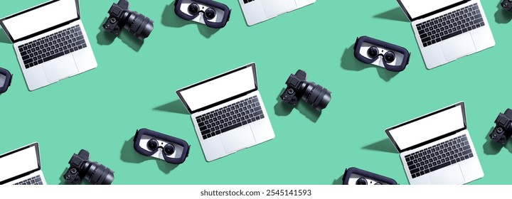 Tech gear theme with vr headset, dslr camera and laptop computer