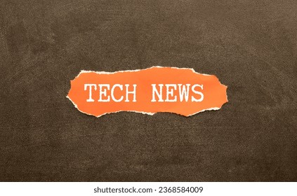 TECH NEWS written on sticky note paper over a kork board. Business concept for newly received or noteworthy information about technology. - Shutterstock ID 2368584009