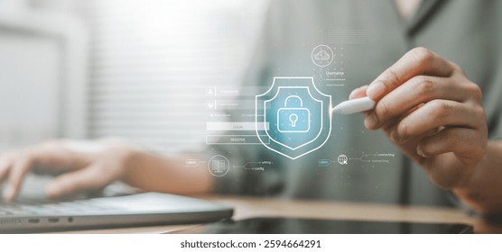 Tech security database attack. confidential data secure crime cyber protect. A person is drawing a blue shield on a computer screen. The shield is surrounded by a blue border and has a key on it.