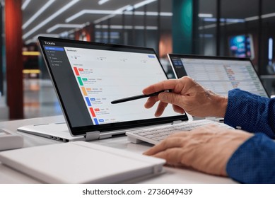 Tech Support Specialist Upgrading Software And Monitoring Ticket System Remotely