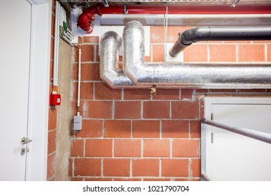 in the technical area, there are boosters for the water pipes and ventilation tubes of the building - Shutterstock ID 1021790704