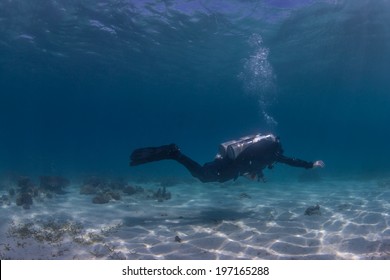 technical diver in the shallows