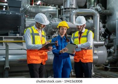 Technical Manager Discussion Together With Factory Workers In Mechanical Room At Industry Factory,Technology And Teamwork Concept. 