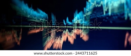 Technical price graph and indicator, red and green candlestick chart on blue theme screen, market volatility, up and down trend.