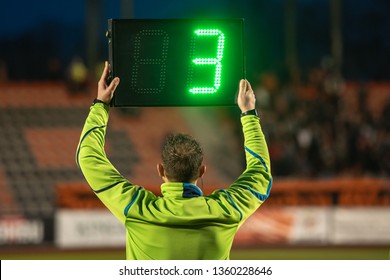 Technical referee shows 3 minutes added time during the football match. - Shutterstock ID 1360228646
