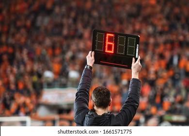 Technical referee shows 6 minutes added time during the football match. - Shutterstock ID 1661571775