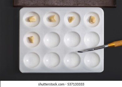 Technical shots of denture and tool on a dental prothetic laboratory 