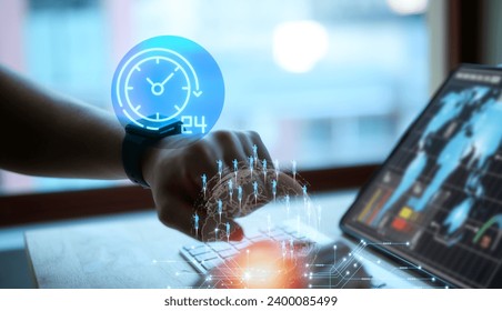 Technical support customer service concept, man working on computer using smartwatch with 24hours customer support, IT support concept