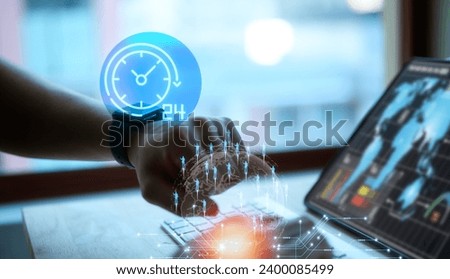 Technical support customer service concept, man working on computer using smartwatch with 24hours customer support, IT support concept