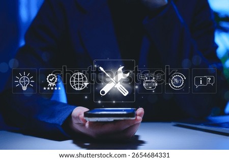 Technical support and customer service concept. Person using smartphone with icons representing technical support, AI chatbot, 24-7 service, solutions for global support, and customer assistance tools