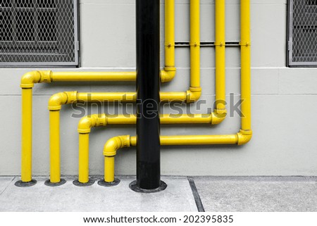 technical system pipes on the exterior wall of a building