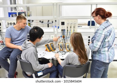 technical vocational training in industry: young apprentices and trainers in the classroom  - Shutterstock ID 1015845604