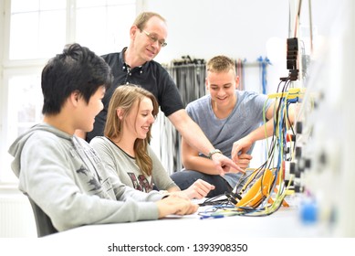 technical vocational training in industry: young apprentices and trainers in the classroom 