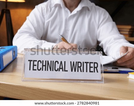 Technical Writer working on documentation in modern office, creating user manuals, software guides and digital content for technology products