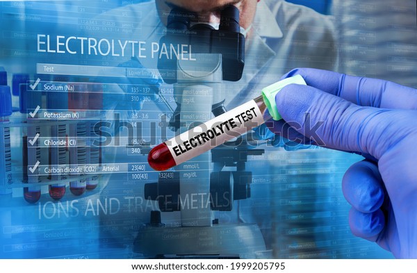 Technician with blood sample for electrolyte\
imbalance test. Protocol with values of range of results. Blood\
sample for analysis and measurement of electrolyte and carbon\
dioxide levels in\
patient.