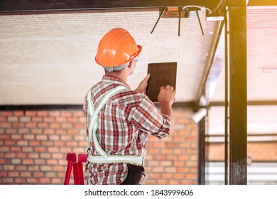 The Technician Is Checking The Signal. After Installing The Internet In The Building