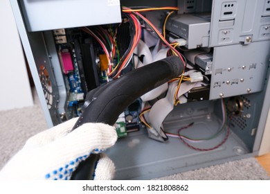 A Technician Cleaning A Computer System Box, HDD With Vacuum Cleaner, Hoover From Dust And Dirt, Diy And Computer Maintenance Concept.