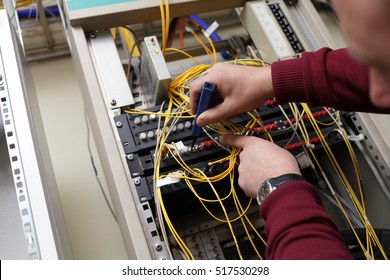 The Technician Cleaning Fiber Optic On The Telecom Site