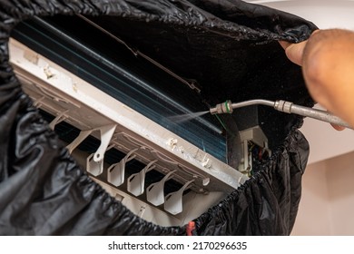 Technician Cleans Air Conditioner By Spraying Stock Photo 2170296635 