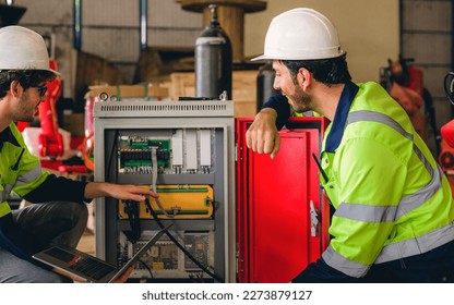 Technician engineer checking and repairing automatic robotic machine - Powered by Shutterstock - Get 15% off with code: PIKWIZARD15