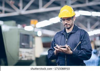 technician engineer standing and checking process on tablet in factory - Powered by Shutterstock