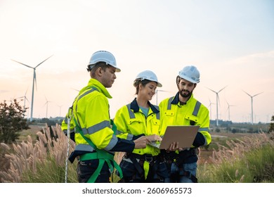 Technician and Engineer Working on a Windmill Turbine in the Field, Harnessing Renewable Energy for Sustainable Power Generation, Using Advanced Technology and Innovation to Support the Environmental
