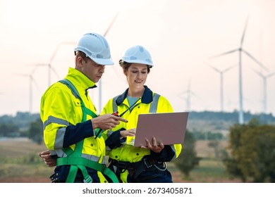 Technician and Engineer Working on a Windmill Turbine in the Field, Harnessing Renewable Energy for Sustainable Power Generation, Using Advanced Technology and Innovation to Support the Environmental