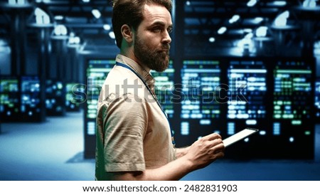 Technician ensuring proper functioning of VPN servers with top security standards used to adequately protect sensitive data. High tech infrastructure providing reliable internet connections for users