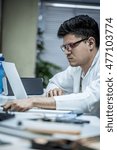 Technician fixing computer hardware