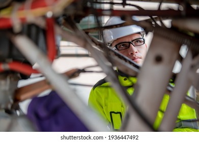 Technician Fixing The Engine Of The Airplane,Female Aerospace Engineering Checking Aircraft Engines,Asian Mechanic Maintenance Inspects Plane Engine