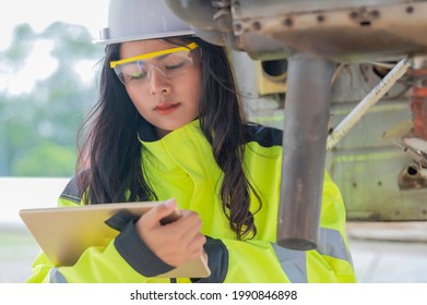 Technician Fixing The Engine Of The Airplane,Female Aerospace Engineering Checking Aircraft Engines,Asian Mechanic Maintenance Inspects Plane Engine