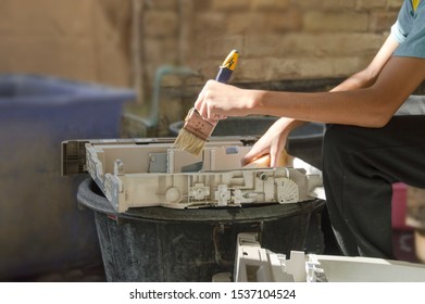 Technician Hand Cleaning Copier Body Part In Overhaul Process