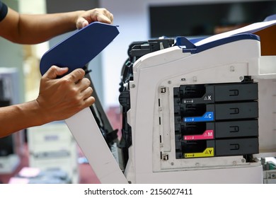 Technician Hand Open Cover Photocopier Or Photocopy To Fix Paper Jam And Replace Ink Cartridges For Scanning Fax Or Copy Document In Office Workplace.